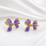 Load image into Gallery viewer, Lavender Bow Gold Rim Stud Earrings