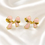 Load image into Gallery viewer, Blush Bow Gold Rim Stud Earrings
