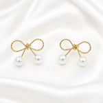 Load image into Gallery viewer, Gold Bow Double Pearl Drop Earrings
