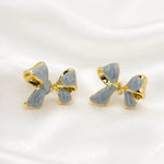 Load image into Gallery viewer, Slate Blue Bow Gold Rim Stud Earrings
