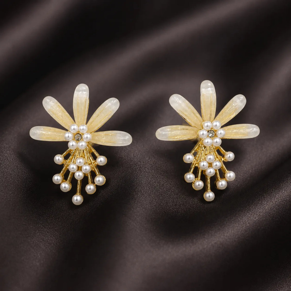 Ivory bow pearl branch drop earrings