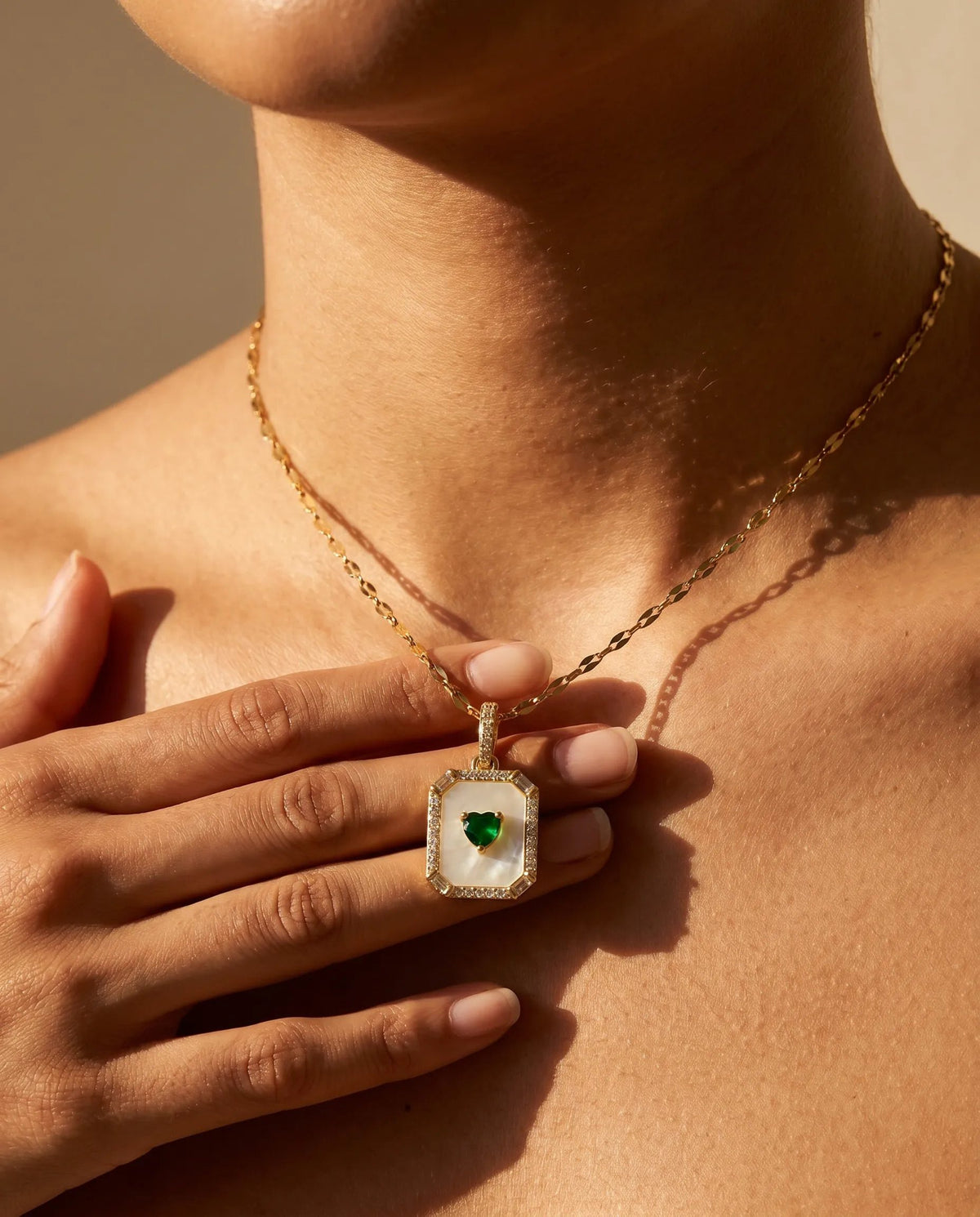 Emerald heart frame necklace