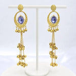 Load image into Gallery viewer, Lavender Stone Ghungroo Tassel Earrings - Gold with blue oval stone, pearl accents and cascading bell tassels
