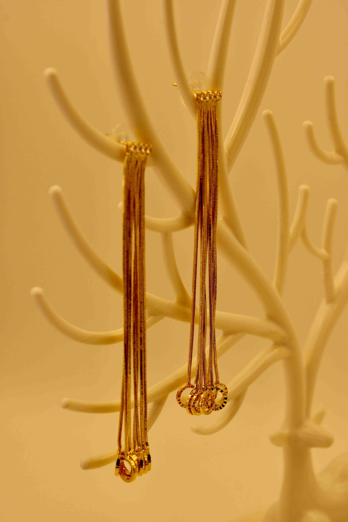 Ruvique golden cascade tassel earings