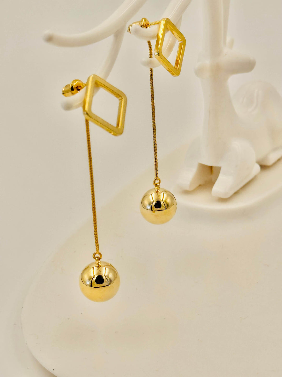 Ruvique Golden Orbit Drop Earings