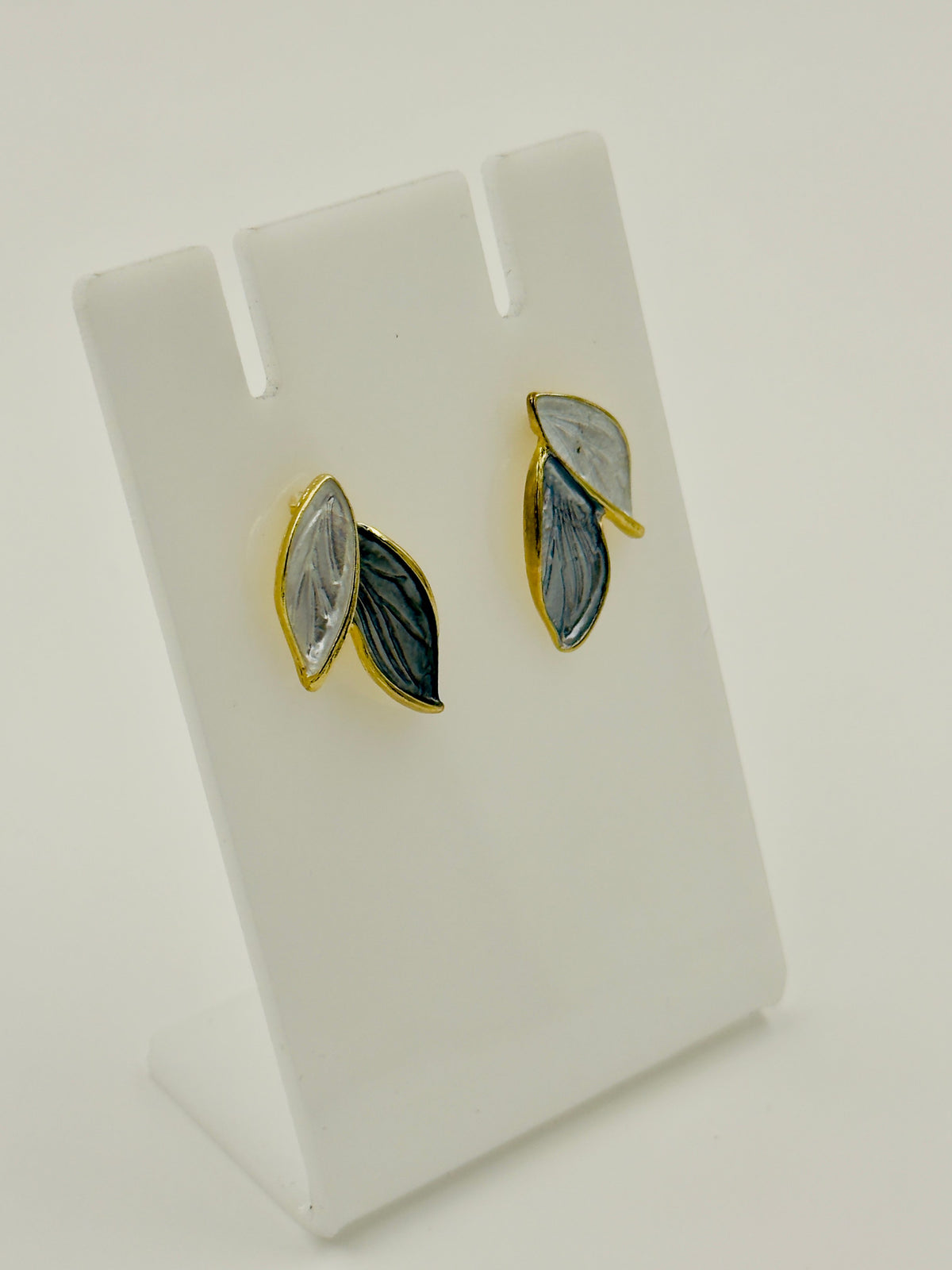 Ruvique dual tone leaf stud earrings