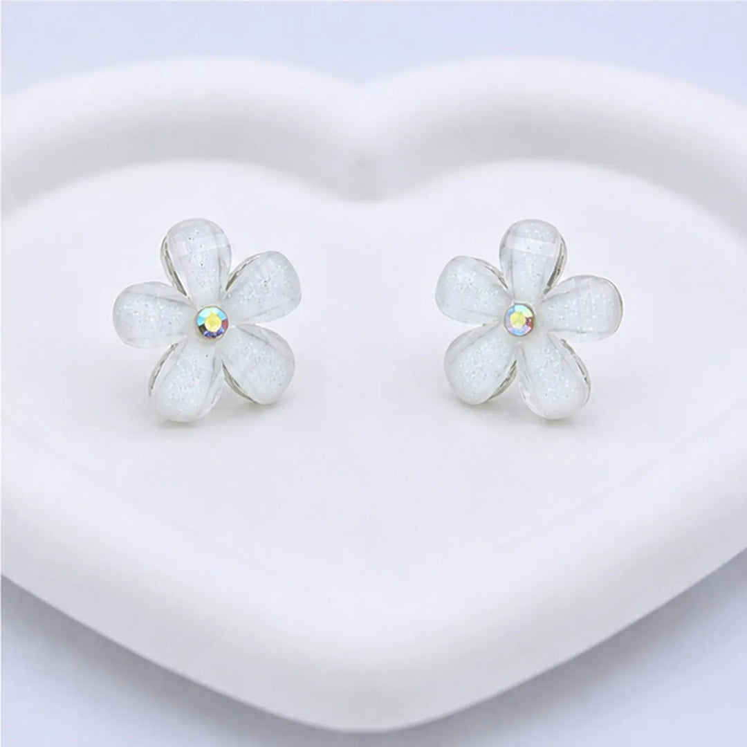 White Blossom Crystal Stud Earrings - Pearlescent five-petal flower studs with iridescent AB crystal centre