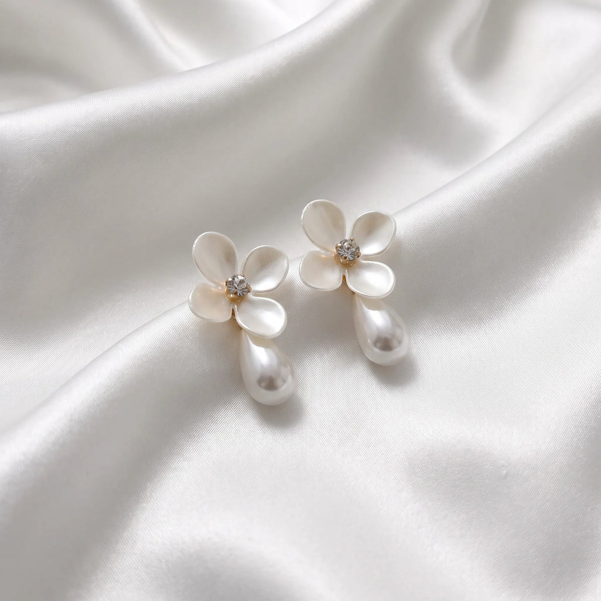 Pearl drop flower stud earrings