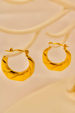 Load image into Gallery viewer, Aurum Twist Hoop Earrings
