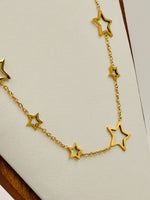 Load image into Gallery viewer, Cosmic Charm Star Necklace
