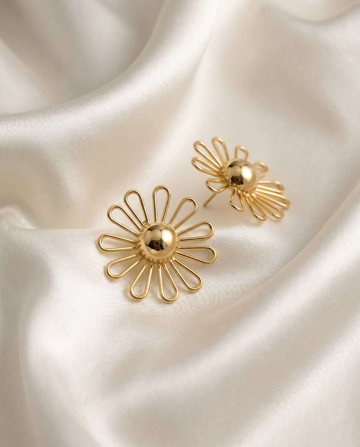 Golden floral stud earrings